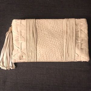 Cream colored clutch with tassel - NWOT